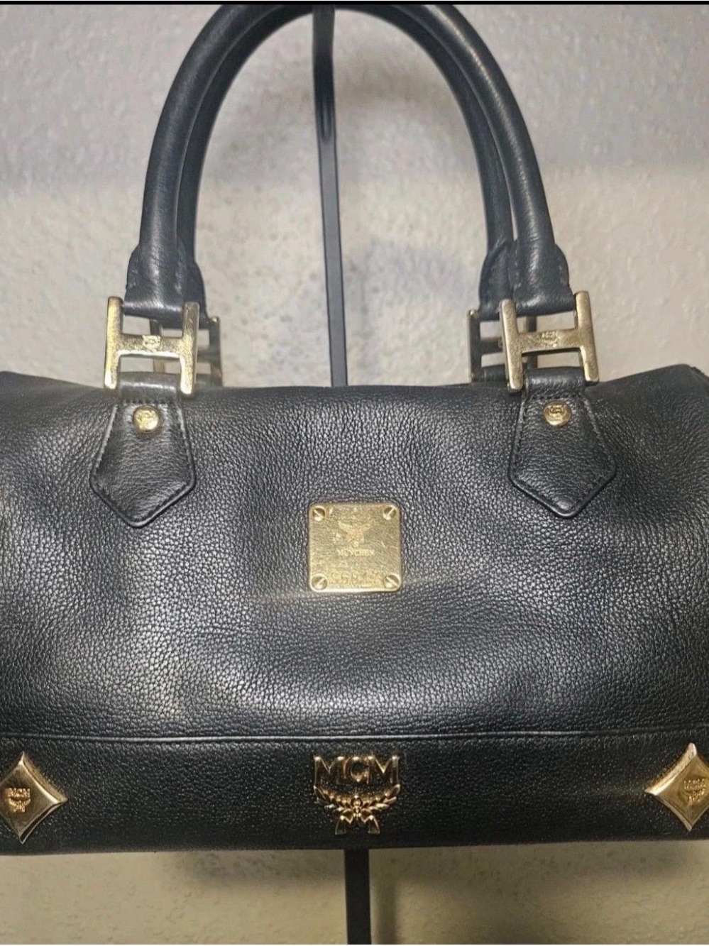 MCM Black Leather Satchel with Gold Hardware Accents
